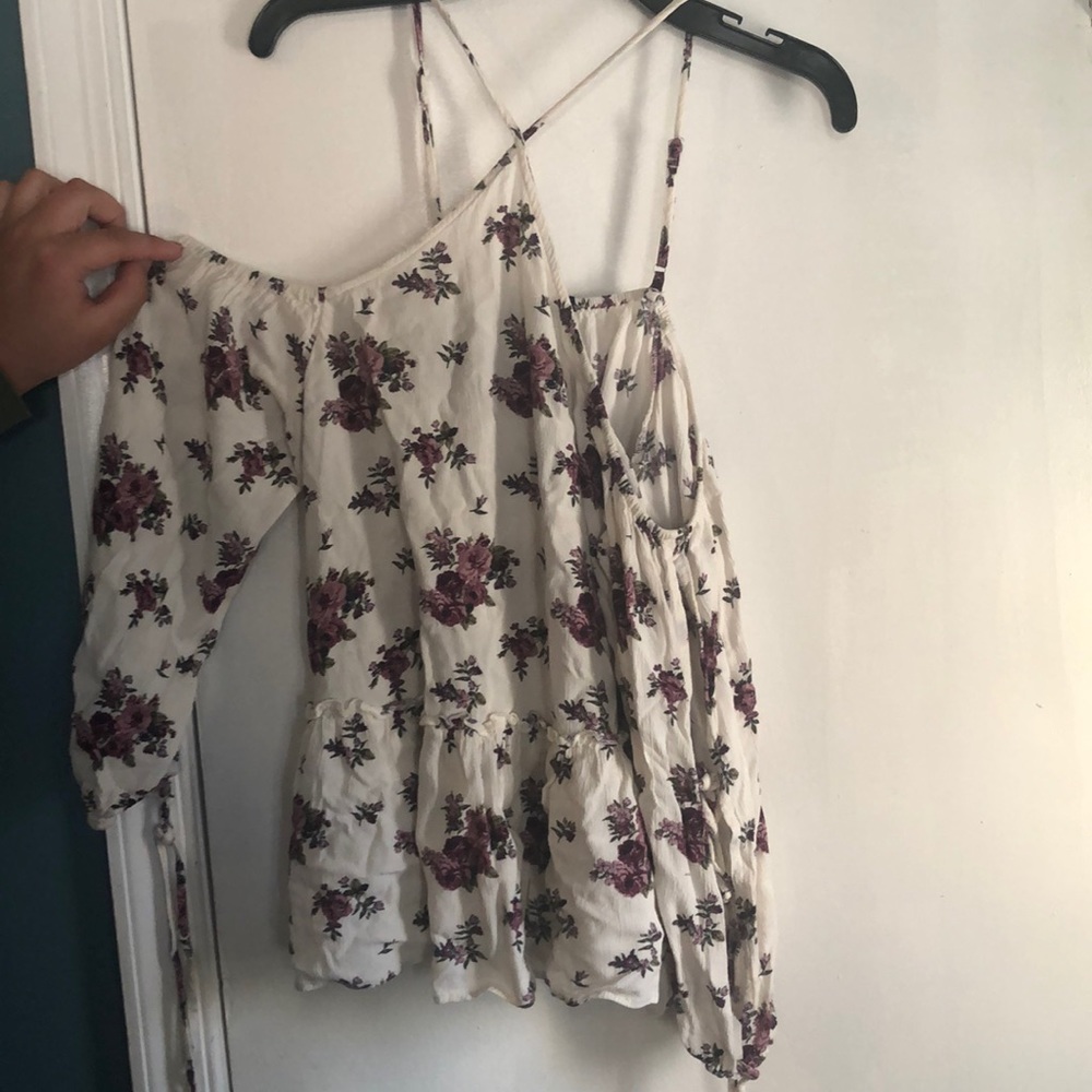A floral off the shoulder shirt